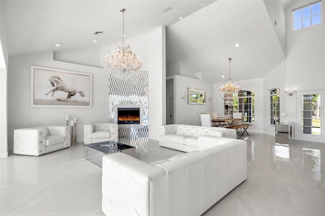 living room with high vaulted ceiling, an inviting chandelier, a fireplace, and light tile floors