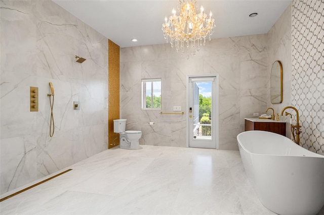 bathroom with tile floors, tile walls, a chandelier, vanity, and toilet