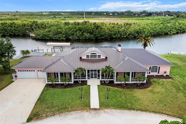 aerial view featuring a water view