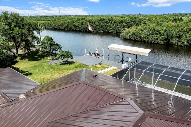 view of dock featuring a yard and a water view