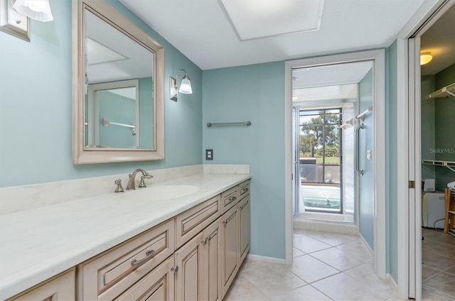 bathroom with vanity and tile patterned floors