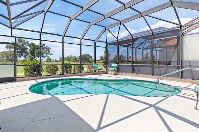 view of pool featuring a lanai and a patio