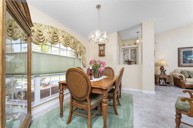 dining area with a chandelier