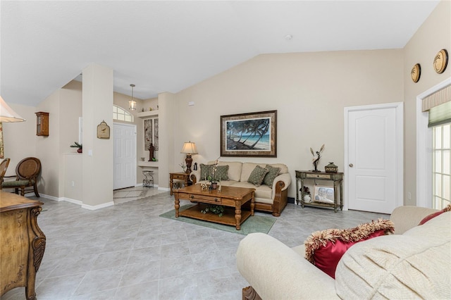 living room with lofted ceiling