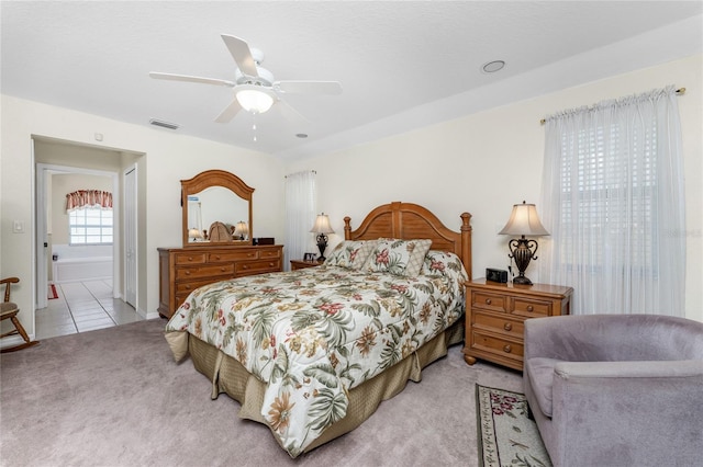 carpeted bedroom featuring ceiling fan