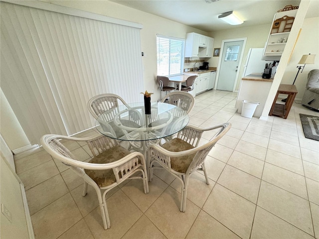 dining room with light tile patterned floors