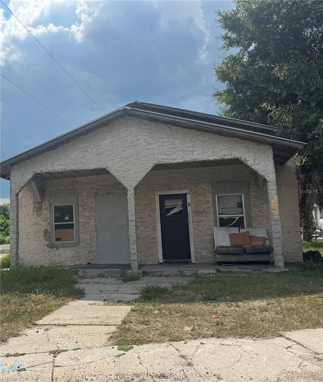 bungalow featuring covered porch