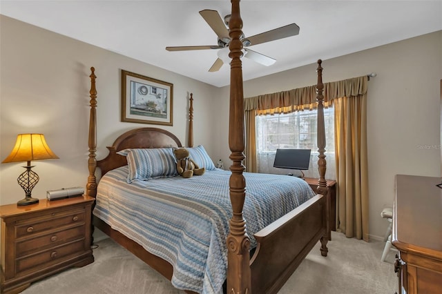 bedroom featuring light colored carpet and ceiling fan