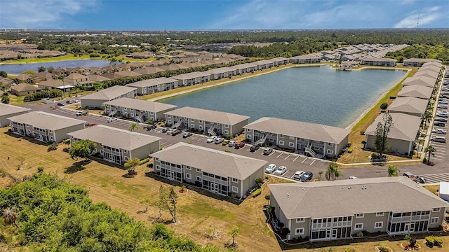 drone / aerial view with a water view