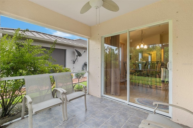 view of patio / terrace featuring ceiling fan