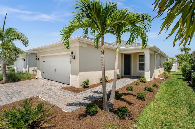 single story home with a garage