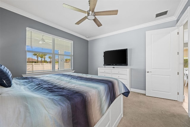 bedroom featuring ceiling fan, light colored carpet, and crown molding