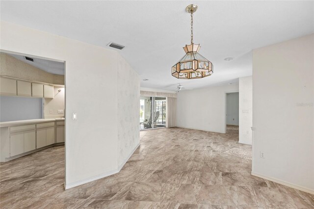 interior space featuring ceiling fan