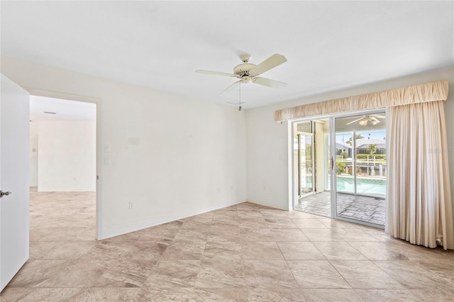 unfurnished room featuring ceiling fan