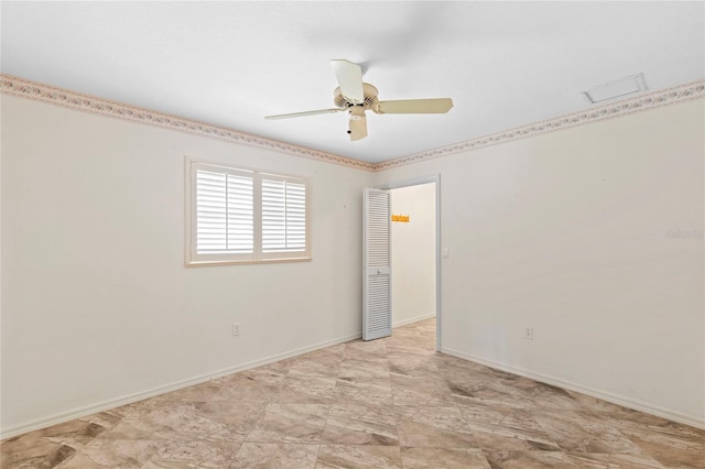 unfurnished room with ceiling fan