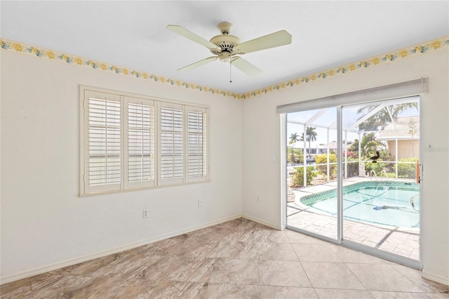 unfurnished room with ceiling fan