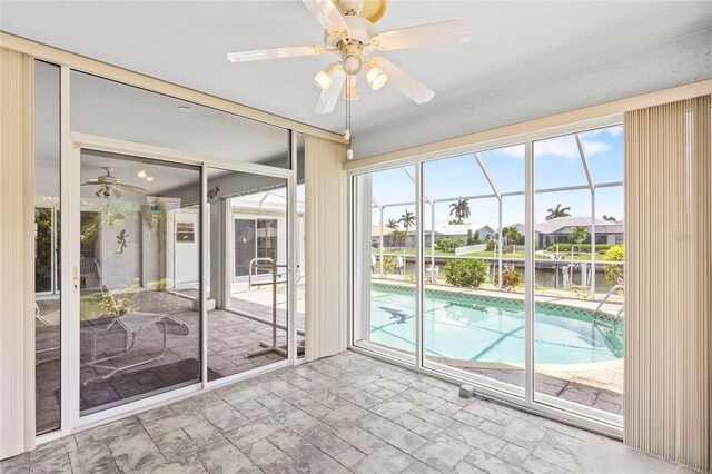 interior space featuring ceiling fan