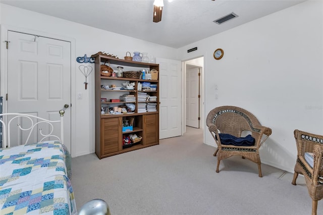 carpeted bedroom with ceiling fan