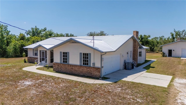 ranch-style house with a front yard, a garage, and cooling unit