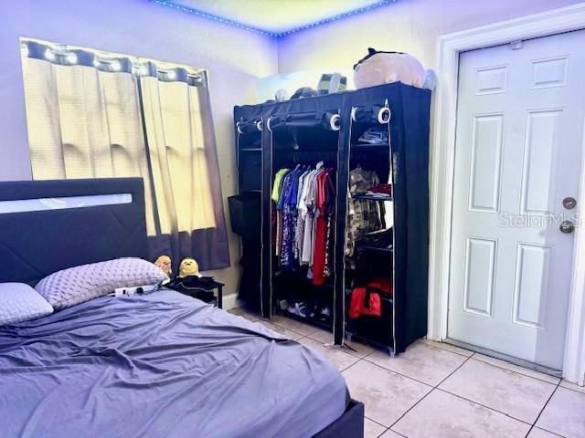 bedroom with tile patterned flooring