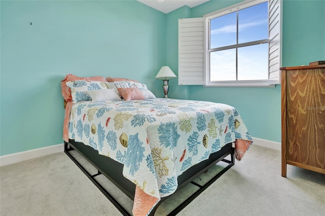 bedroom with light carpet