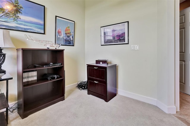 interior space featuring light colored carpet