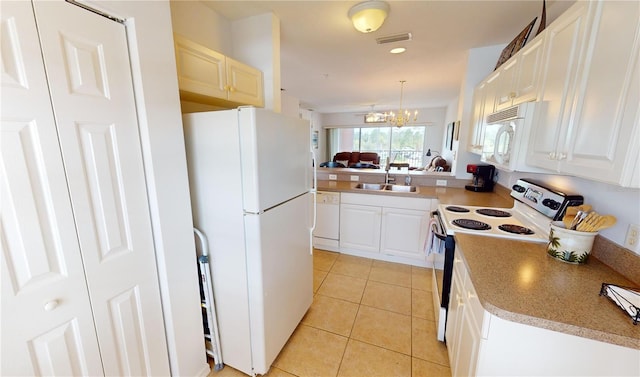 kitchen featuring pendant lighting, white appliances, white cabinetry, and light tile patterned floors