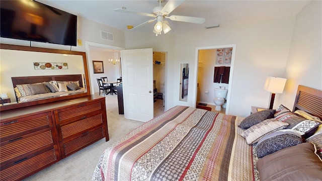 carpeted bedroom featuring ensuite bathroom and ceiling fan