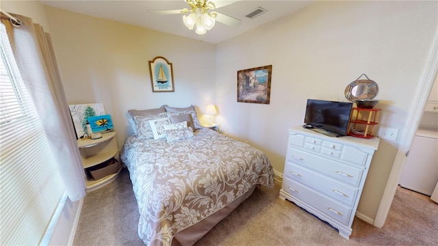 carpeted bedroom with ceiling fan