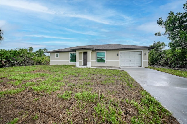 view of front facade featuring an attached garage, a front lawn, concrete driveway, and stucco siding