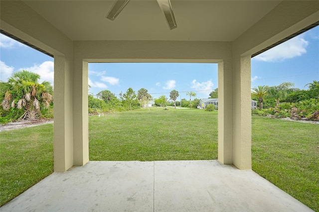 view of patio featuring ceiling fan