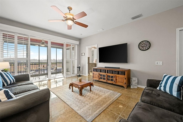 living room with light tile patterned floors