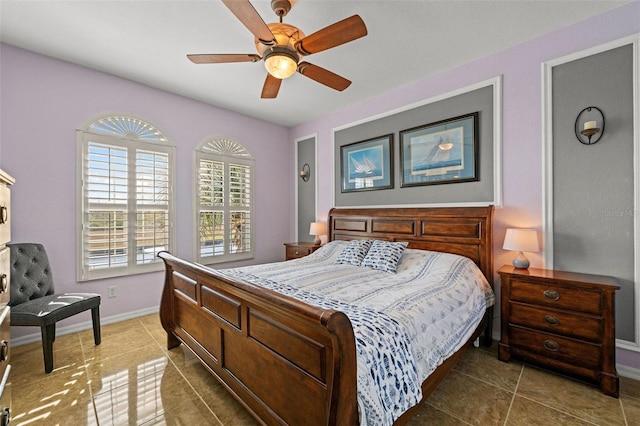 tiled bedroom with ceiling fan