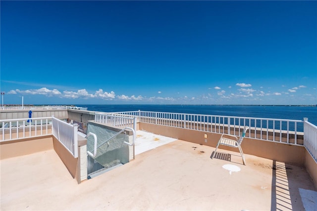 view of patio / terrace featuring a water view