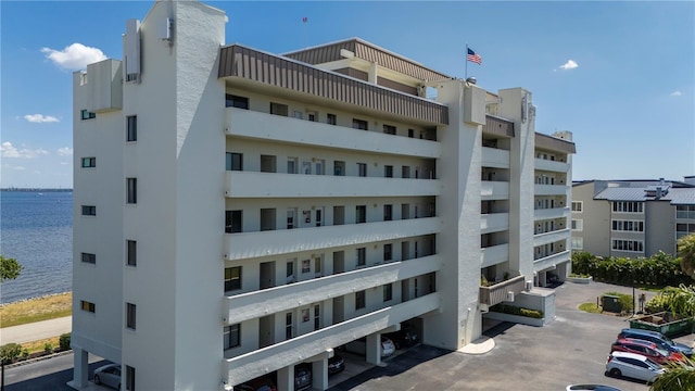 view of building exterior featuring a water view