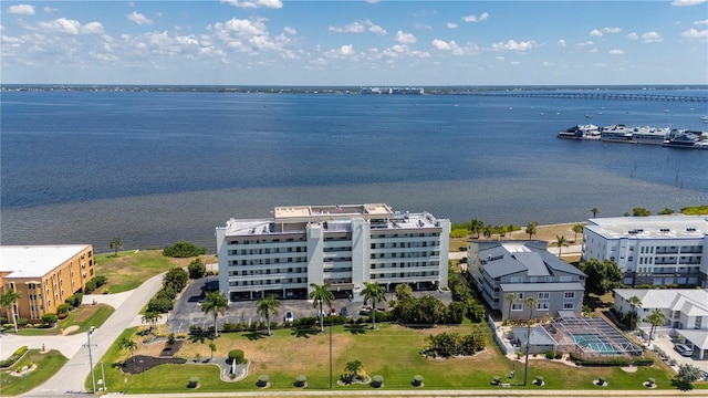 birds eye view of property featuring a water view