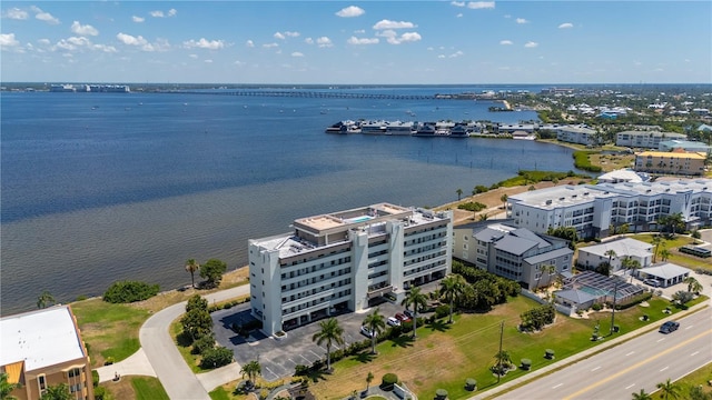 birds eye view of property with a water view