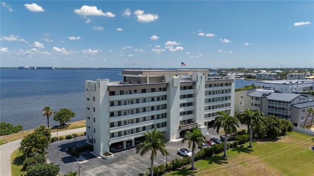 view of building exterior with a water view