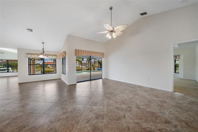 unfurnished living room with ceiling fan, tile patterned flooring, and high vaulted ceiling