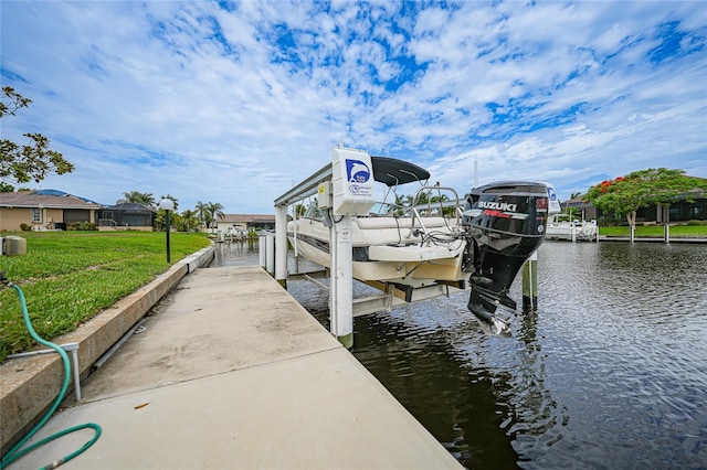 view of dock with a water view