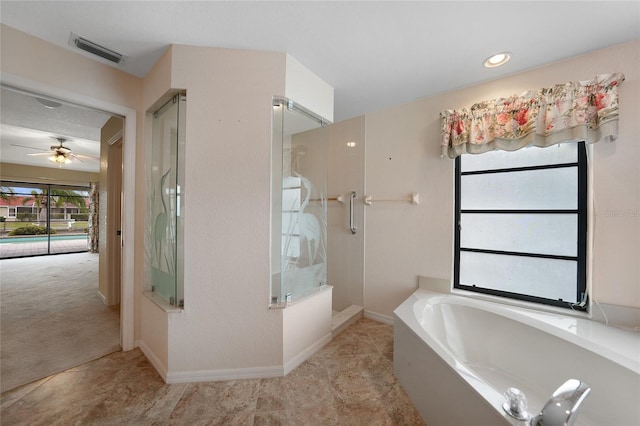 bathroom featuring ceiling fan and shower with separate bathtub