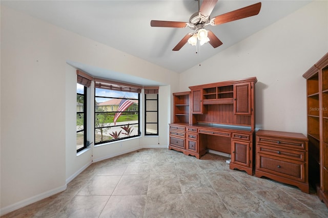 unfurnished office featuring vaulted ceiling and ceiling fan