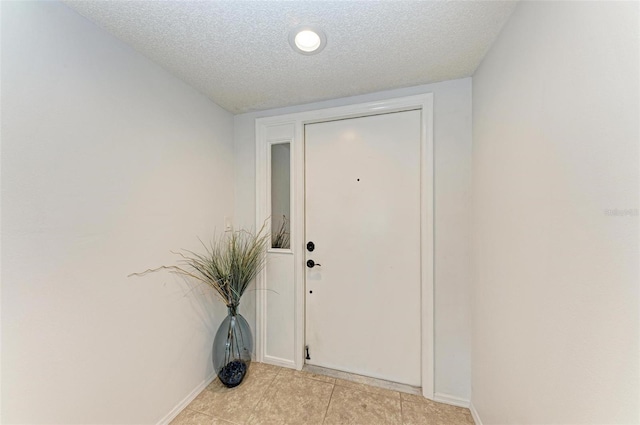 interior space with a textured ceiling