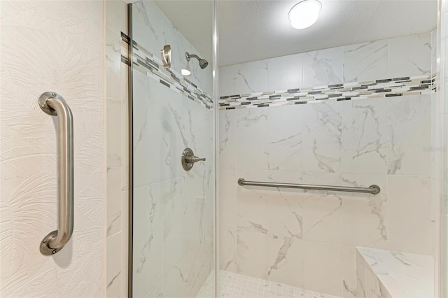 bathroom featuring an enclosed shower