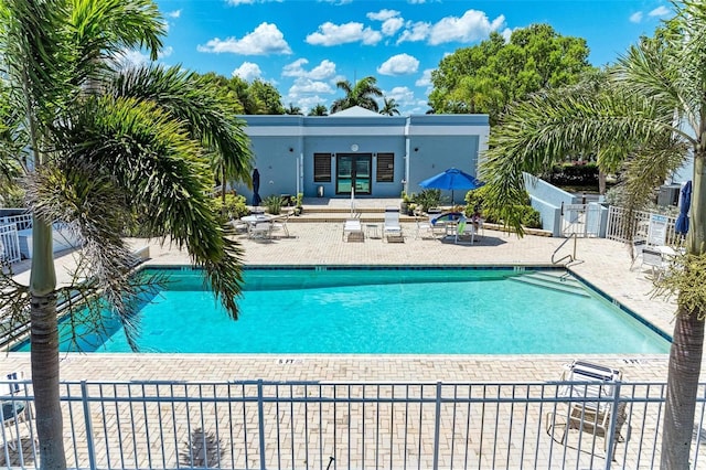 view of pool featuring a patio