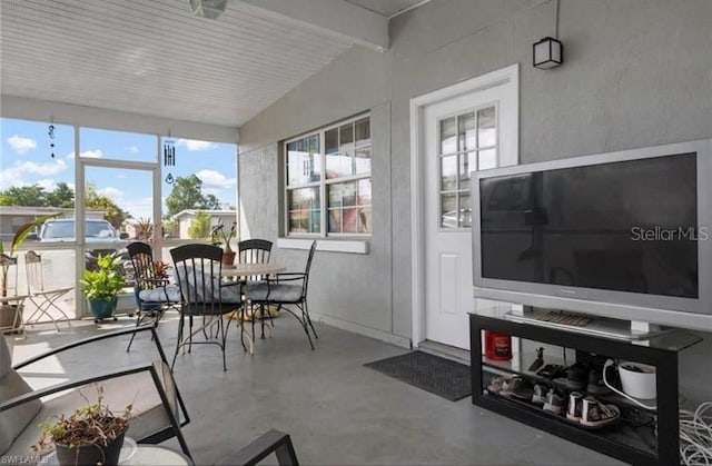 sunroom featuring plenty of natural light