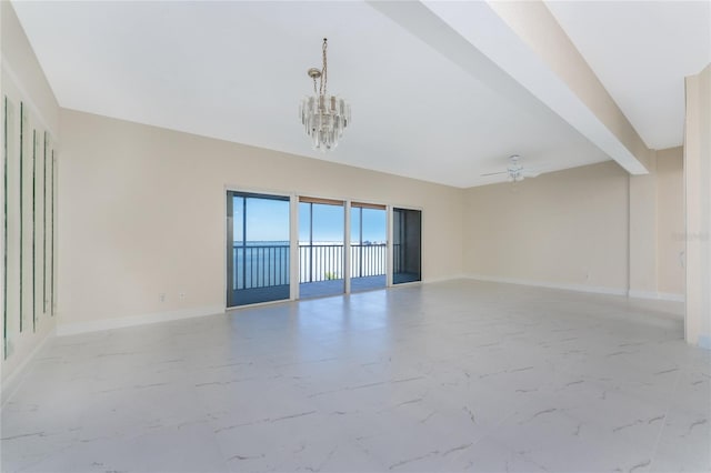 empty room featuring beamed ceiling and ceiling fan with notable chandelier