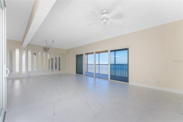 empty room with beamed ceiling and ceiling fan with notable chandelier