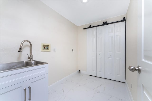 laundry area featuring hookup for an electric dryer, washer hookup, cabinets, and sink