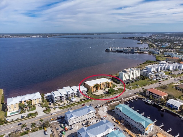 drone / aerial view with a water view